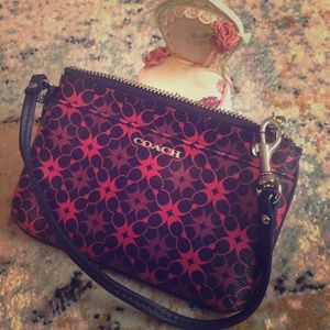 Multi-colored COACH wristlet.